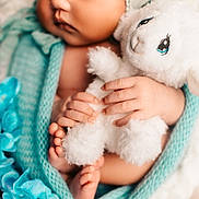 Harret Eloise joined the competition — help win amazing prizes! baby, sleeping, stuffed_toy, lamb, blanket, knit, blue_flower, hand, feet, cozy, soft, infant, cute, child, portrait, closeup, peaceful, resting, wrapped, toy