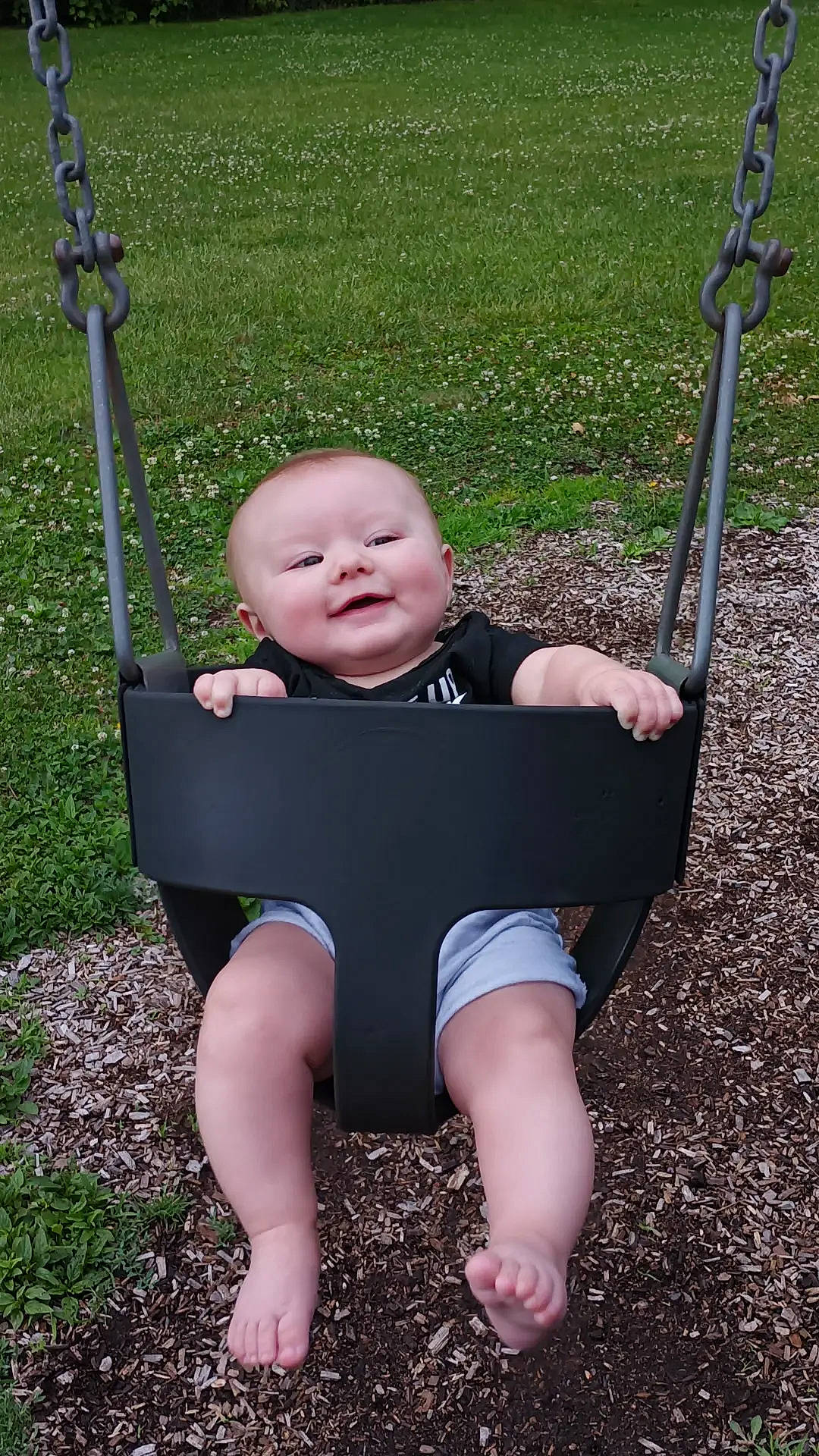 Mayson is registered to the contest to win money with this photo: baby, baby_toddler_clothing, chair, child, electric_blue, eye, fun, grass, happy, joy, leaf, leisure, people_in_nature, person, photograph, play, product, public_space, sitting, smile