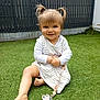 Lyana participe au concours pour gagner de l'argent avec cette photo : toddler, child, smiling, grass, outdoor, pigtails, blanket, pacifier, toy, striped_clothing, happy, cute, young_child, playful, barefoot, fence, daylight, person, sitting, nature
