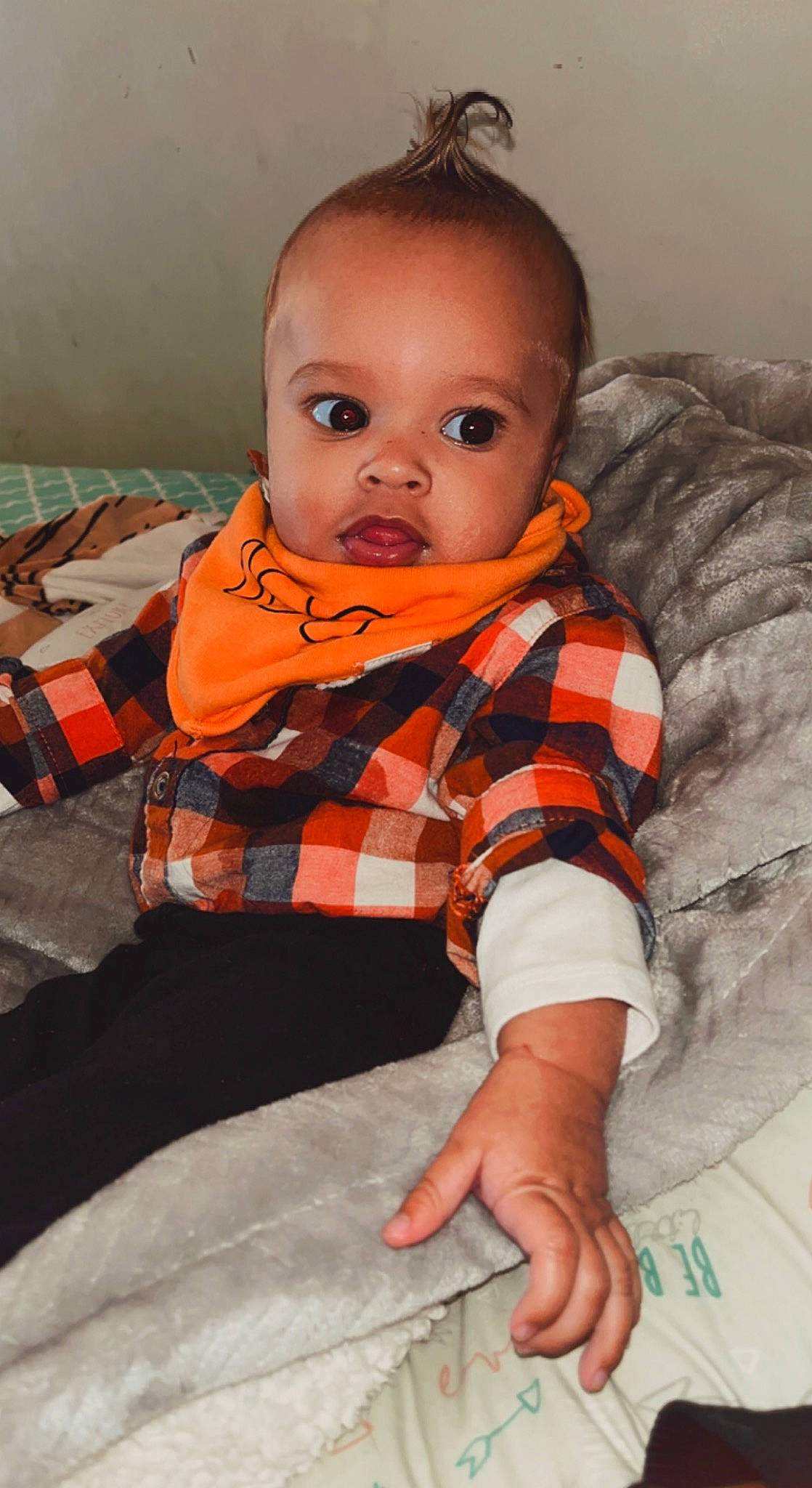 Dante joined the competition — help win amazing prizes! baby, baby_toddler_clothing, cheek, child, collar, comfort, eye, finger, head, iris, neck, nose, orange, pattern, person, plaid, skin, sleeve, tartan, toddler