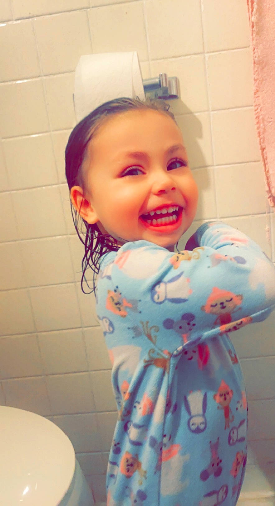 Nevaeh is registered to the contest to win money with this photo: bathroom, cheek, chin, eye, face, happy, head, headgear, iris, lip, mouth, neck, nose, person, plumbing_fixture, purple, shoulder, skin, sleeve, smile
