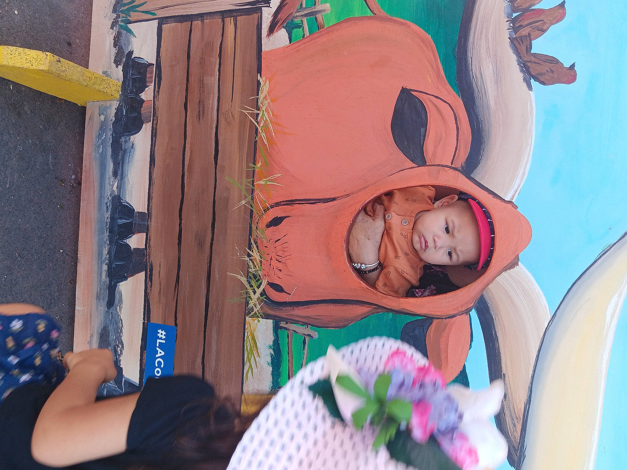 Justice is registered to the contest to win money with this photo: art, azure, blue, child, fun, happy, headwear, leisure, magenta, mouth, orange, peach, person, pink, plant, recreation, red, room, toddler, vacation