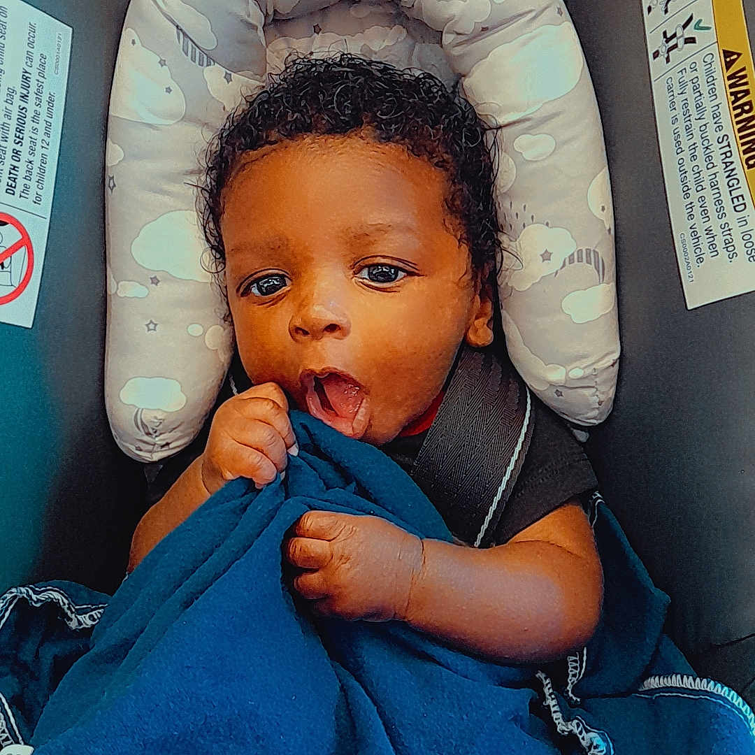 Tacorius joined the competition — help win amazing prizes! architecture, baby, babylaughing, blanket, building, couch, crib, cushion, face, furniture, happy, head, homedecor, hospital, infantbed, person, photography, portrait, smile, yawning