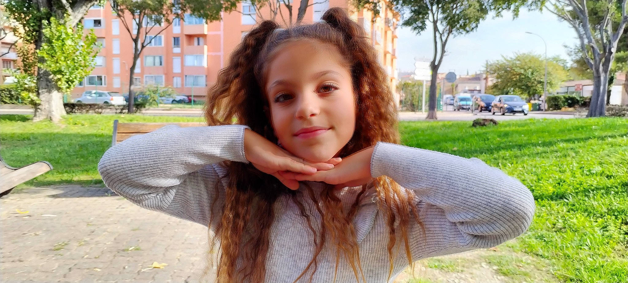 Tess participe au concours pour gagner de l'argent avec cette photo : black_hair, eyelash, fawn, finger, gesture, grass, hair, hairstyle, happy, jaw, joy, layered_hair, leisure, lip, long_hair, neck, nose, person, plant, step_cutting