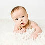 Bryson joined the competition — help win amazing prizes! baby, infant, child, face, eyes, skin, blanket, knitted_clothing, cute, portrait, soft_texture, white_background, closeup, newborn, hands, expression, lying_down, baby_girl, baby_boy, adorable