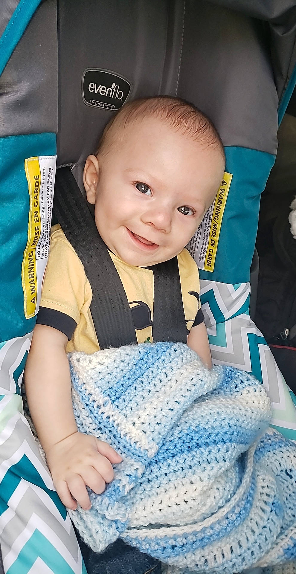 Clinton joined the competition — help win amazing prizes! baby, baby_carriage, baby_products, blanket, car_seat, cheek, child, eye, face, head, iris, joy, linens, person, product, sitting, skin, smile, textile, toddler