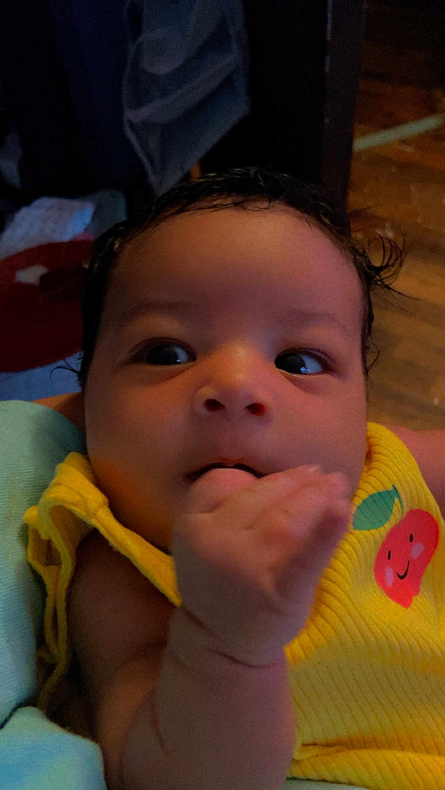 Aurora joined the competition — help win amazing prizes! baby, child, close_up, curious, cute, expression, face, hand, human, indoors, infant, newborn, person, portrait, skin, smiling_graphic, soft_lighting, toddler, yellow_clothing, young