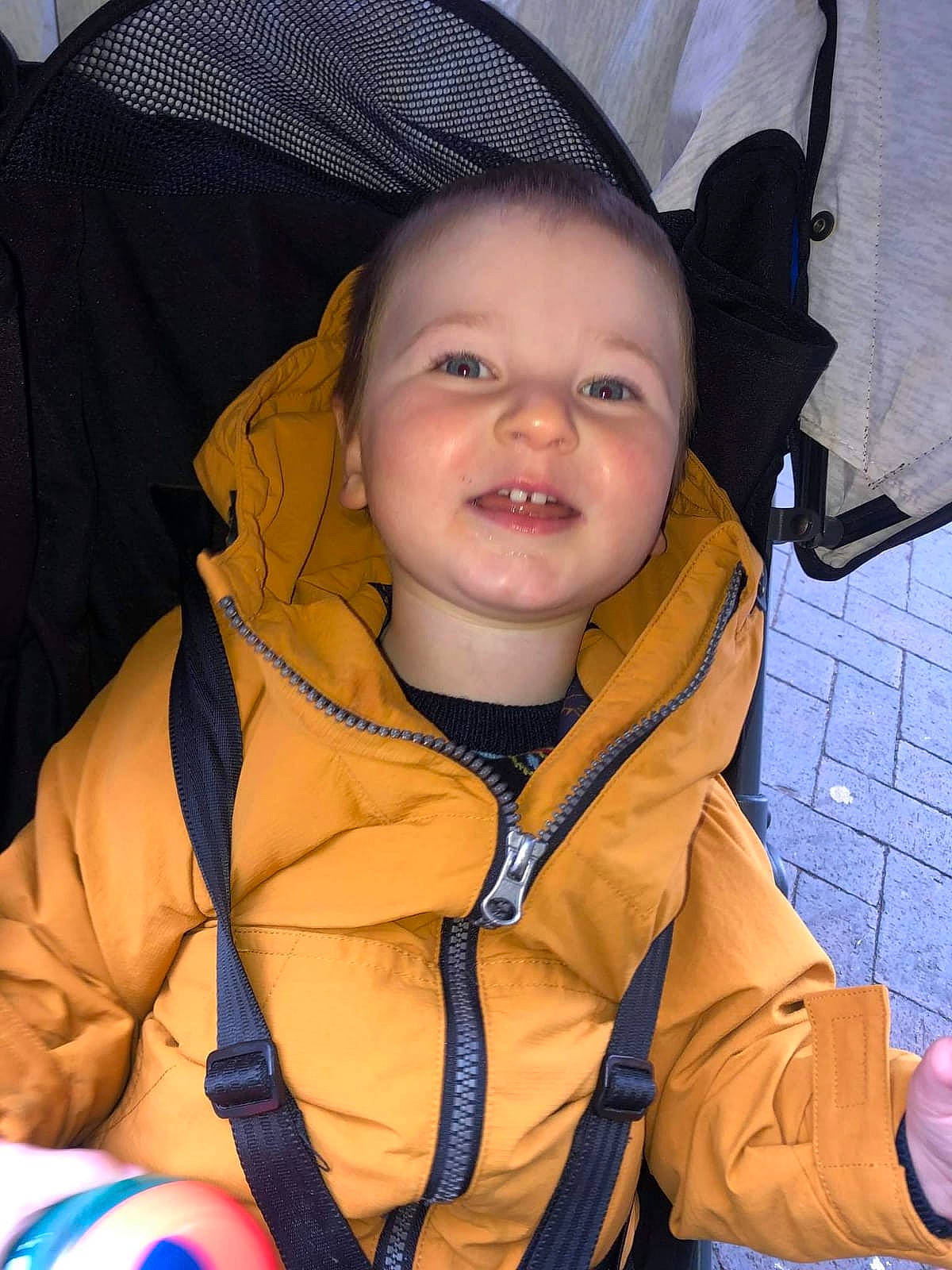 Jamie-leigh is registered to the contest to win money with this photo: blue, cheek, comfort, cool, eye, eyebrow, finger, hairstyle, happy, head, iris, mouth, nose, orange, outerwear, person, skin, sleeve, smile, toddler