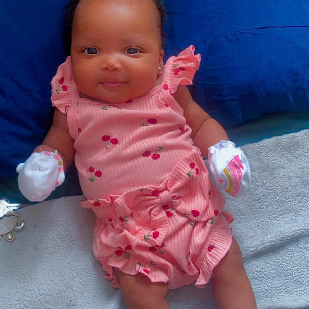 Yeovana is registered to the contest to win money with this photo: baby, bed, clothing, couch, cushion, face, footwear, furniture, glove, head, homedecor, hosiery, newborn, person, photography, portrait, shoe, shorts, sitting, sock