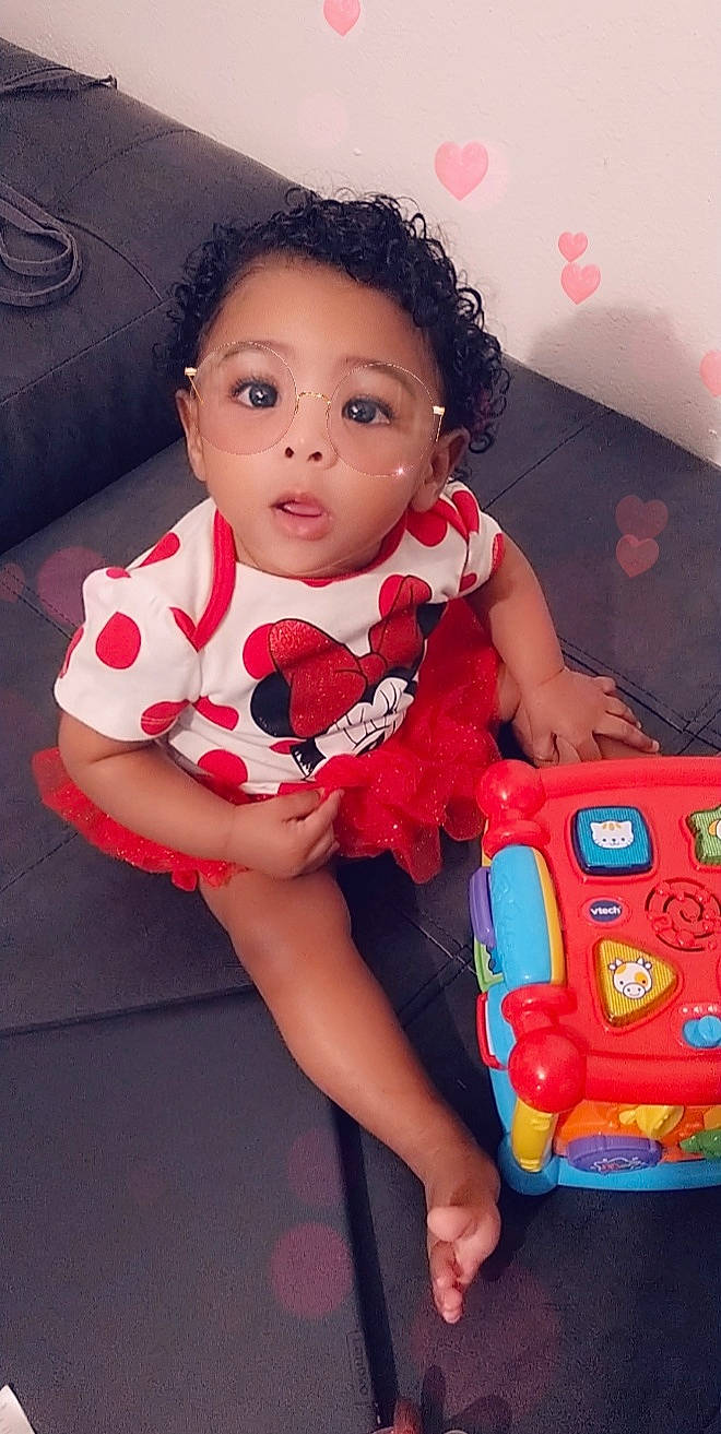 Robin is registered to the contest to win money with this photo: baby, baby_products, cheek, child, leg, person, play, product, sitting, thigh, toddler, toy