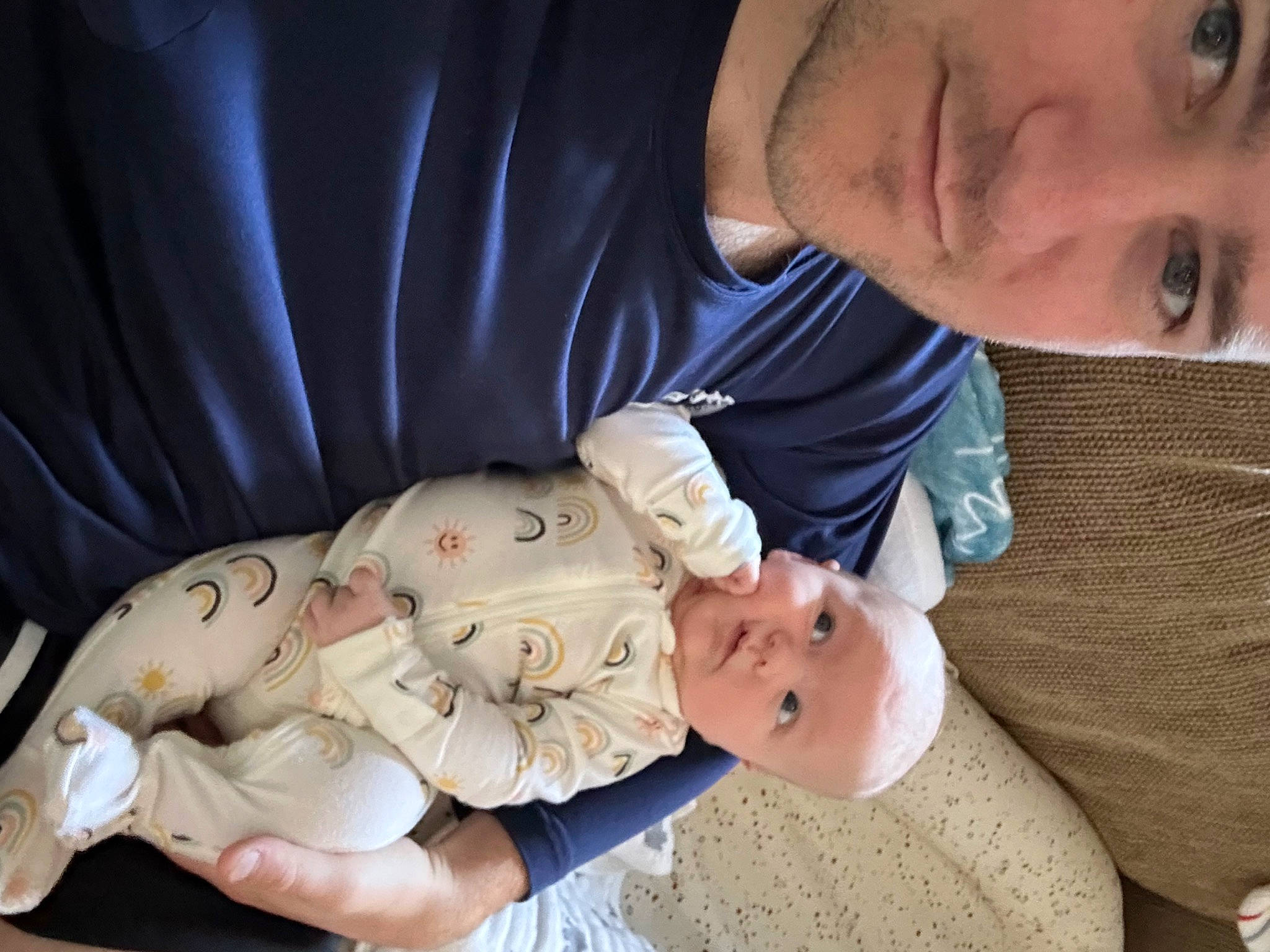 Hayes is registered to the contest to win money with this photo: abdomen, arm, baby, cheek, child, comfort, ear, event, eye, eyelash, finger, gesture, hand, happy, headwear, mammal, mouth, nose, person, skin