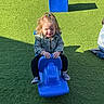 Ayla joined the competition — help win amazing prizes! child, playground, blue_toy, rocking_toy, green_grass, denim_jacket, black_pants, checkered_shoes, pony_tail, outdoor, sunlight, happy, smiling, playing, kid, casual_clothing, daytime, shadow, fun, recreation