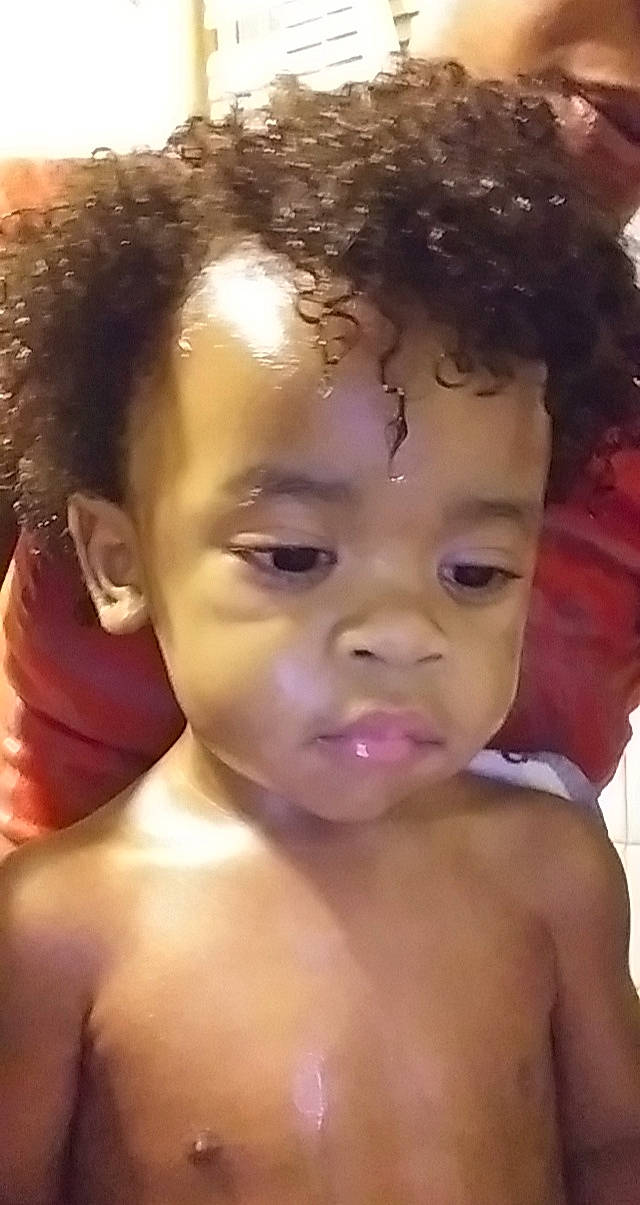 Juan is registered to the contest to win money with this photo: afro, beauty, black_hair, cheek, child, chin, close_up, eyebrow, face, forehead, hair, hairstyle, head, human, lip, mouth, neck, nose, person, skin