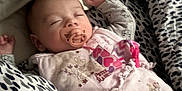 Hallie is registered to the contest to win money with this photo: baby, sleeping, pacifier, blanket, bedding, pattern, infant, cute, cozy, bed, child, soft, peaceful, resting, clothing, indoors, comfort, cute_baby, nap, sleep