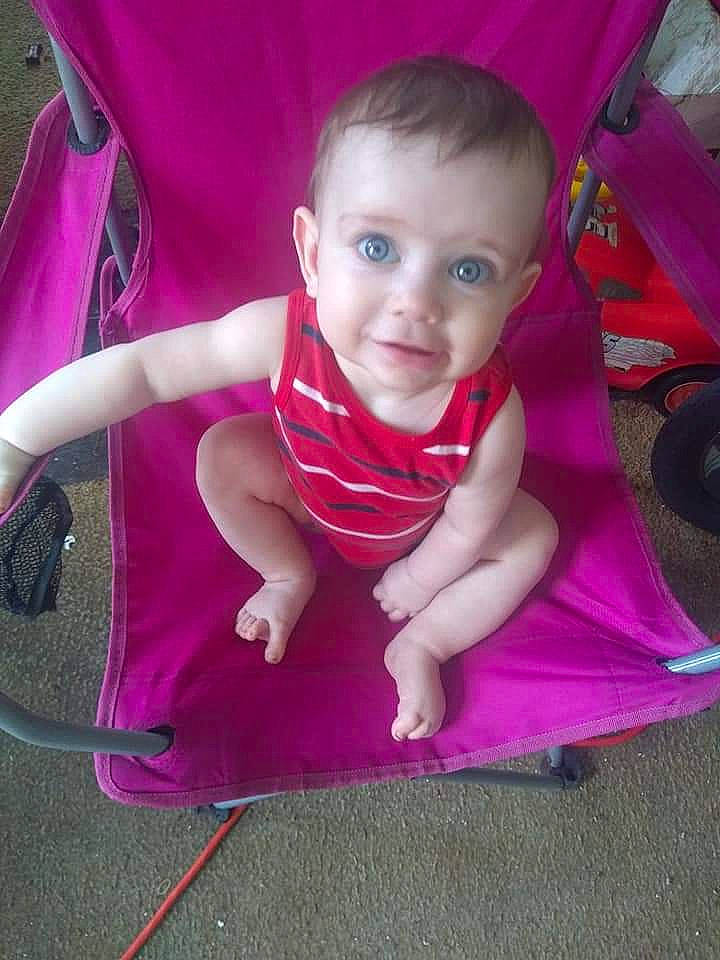 David is registered to the contest to win money with this photo: baby, baby_carriage, baby_products, child, magenta, person, pink, product, smile, toddler