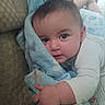 Ruthanne is registered to the contest to win money with this photo: baby, blanket, blue, child, clothing, comfort, couch, cute, face, hand, indoors, infant, person, portrait, resting, soft, texture, toddler, white, young