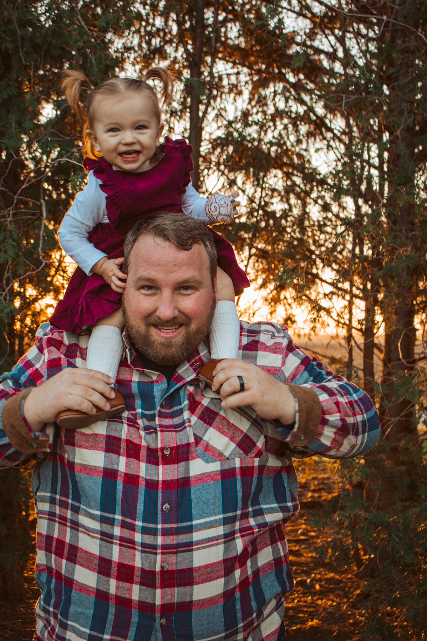 Sutton is registered to the contest to win money with this photo: event, fun, gesture, grass, hand, happy, human, joy, leaf, pattern, people_in_nature, person, photograph, plaid, sky, sleeve, smile, standing, tartan, toddler