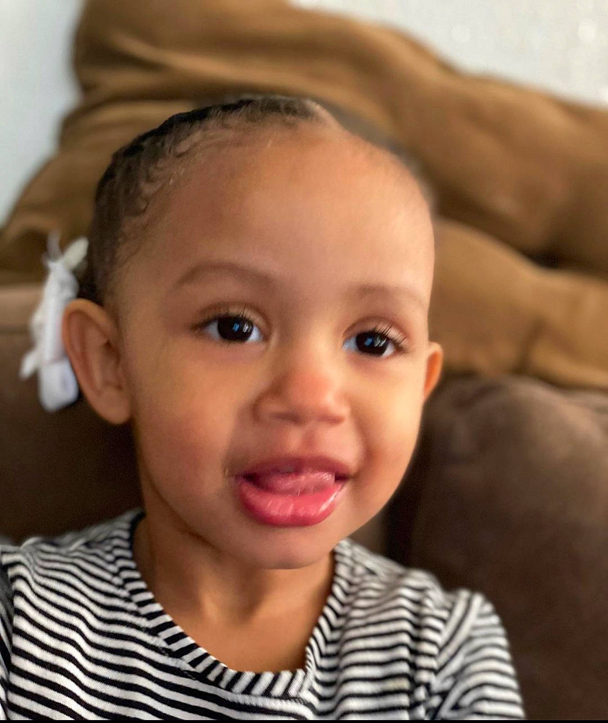 Aliza is registered to the contest to win money with this photo: baby, beauty, cheek, child, chin, ear, eye, eyebrow, face, facial_expression, forehead, hair, hairstyle, head, lip, nose, organ, person, skin, smile