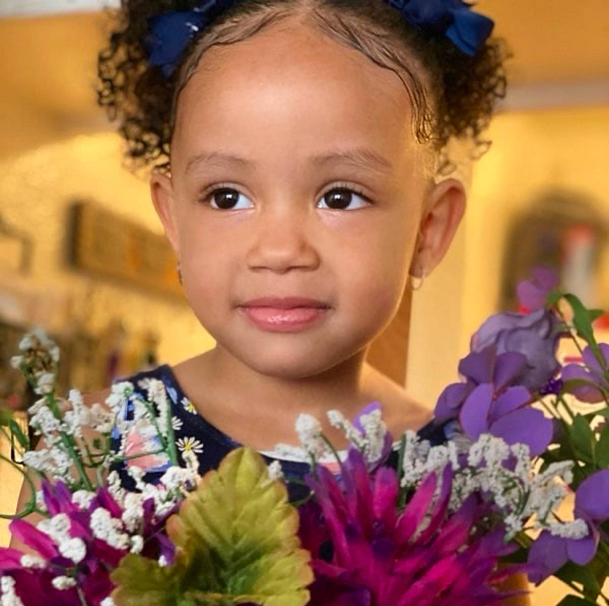 Aliza is registered to the contest to win money with this photo: child, child_model, flower, hair, hair_accessory, hairstyle, happy, person, plant, smile