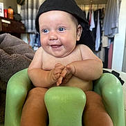 Swade joined the competition — help win amazing prizes! architecture, baby, baseballcap, building, cap, chair, clothing, couch, face, furniture, happy, hat, head, indoors, newborn, person, photography, portrait, sitting, smile