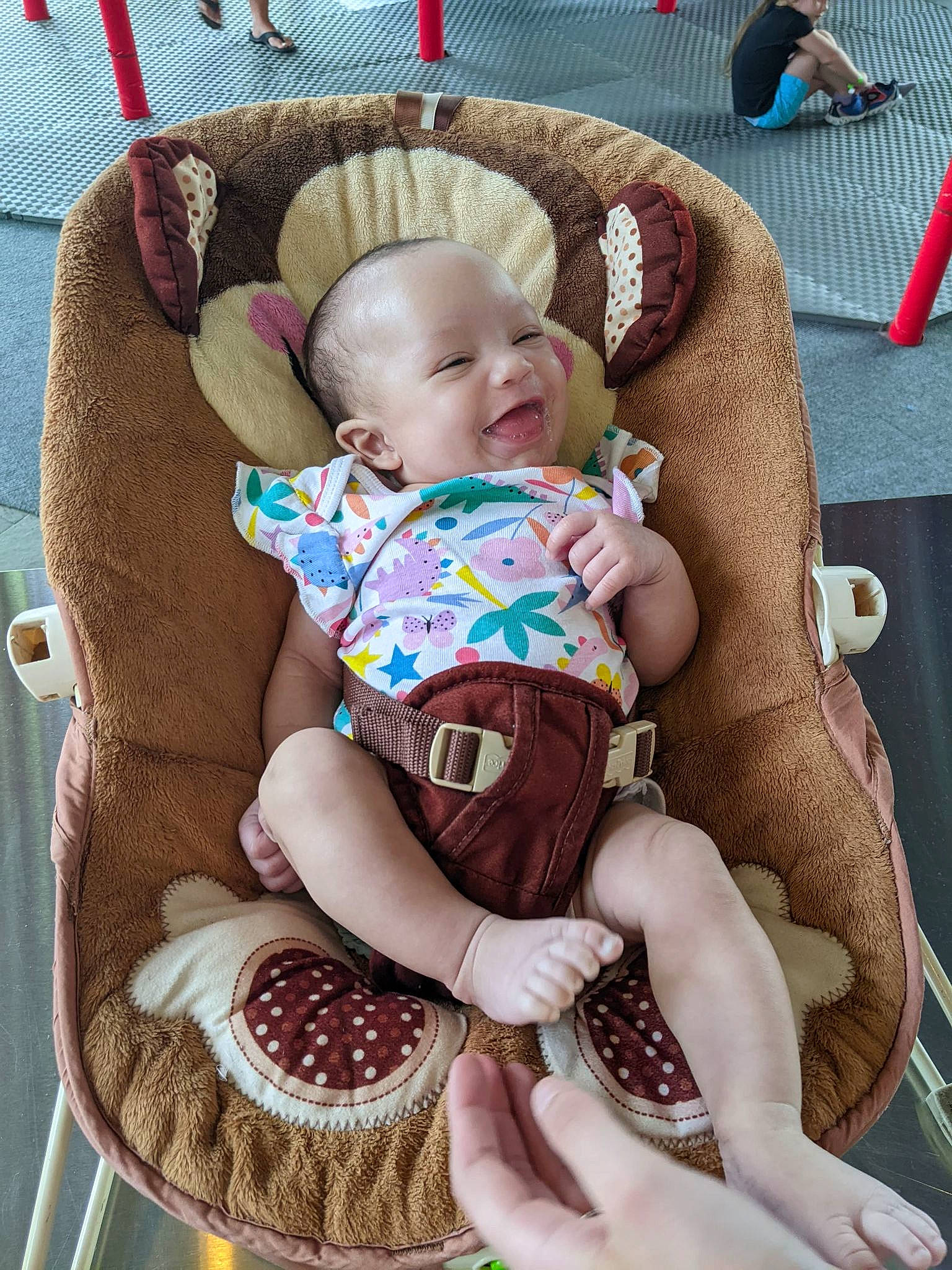 Arya joined the competition — help win amazing prizes! baby, baby_carriage, baby_products, baby_toddler_clothing, chair, cheek, child, comfort, foot, human_leg, lap, leg, linens, pattern, person, sitting, skin, sock, thigh, toddler