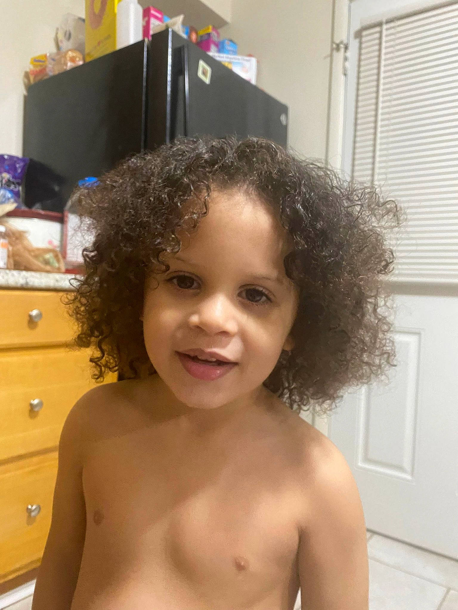 Isaiah joined the competition — help win amazing prizes! afro, black_hair, cabinetry, chest, chin, drawer, dresser, eye, eyebrow, eyelash, face, forehead, hair, hairstyle, happy, joy, lip, long_hair, person, shoulder