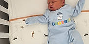 Austin joined the competition — help win amazing prizes! newborn, baby, crib, sleeping, blue_onesie, stuffed_animals, blanket, animal_print, infant, child, peaceful, soft_toys, bed, sleep, cute, indoors, baby_clothes, resting, toddler, cozy
