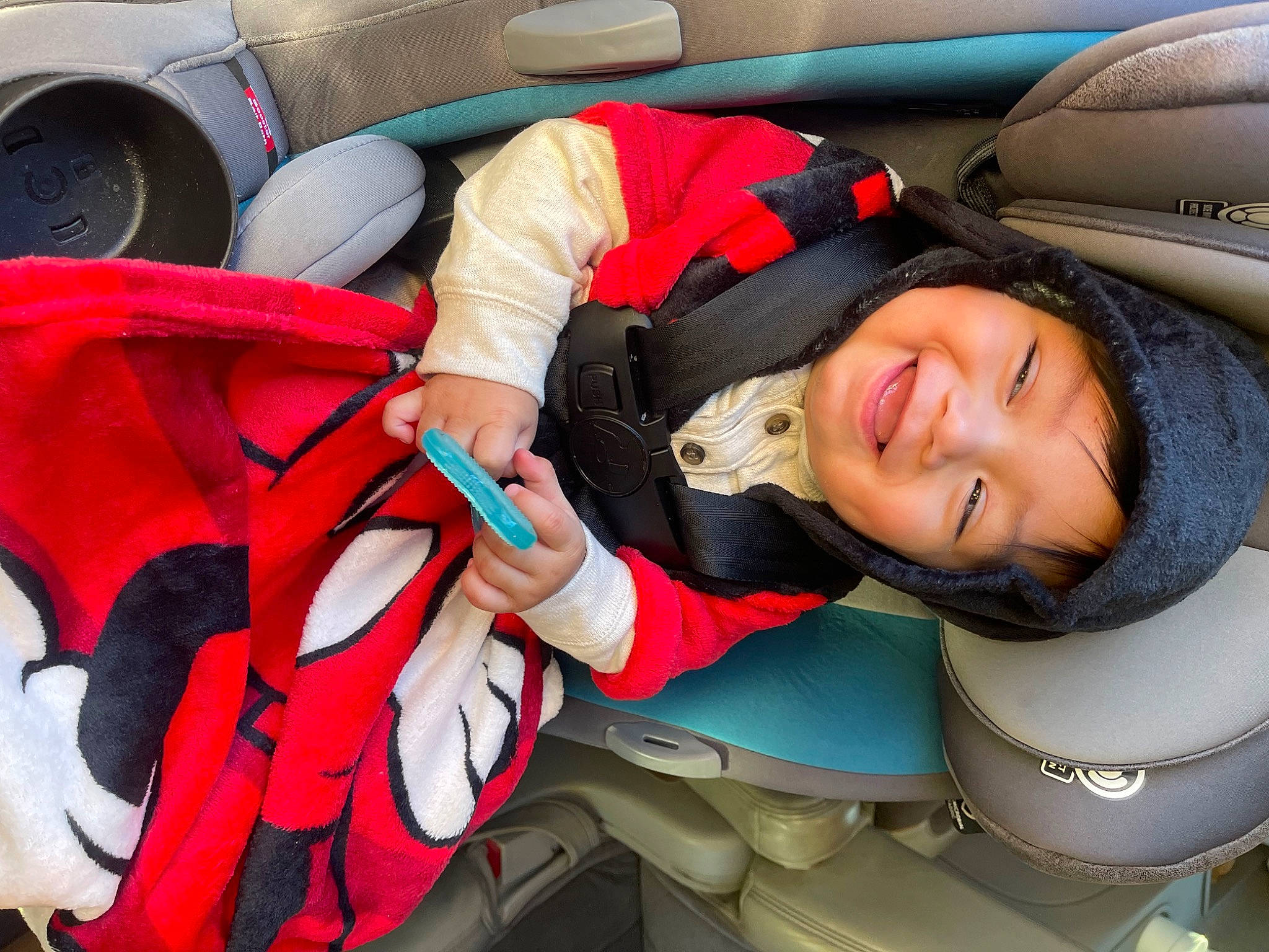 Bryan is registered to the contest to win money with this photo: auto_part, automotive_design, automotive_exterior, automotive_tire, baby_products, car_seat, car_seat_cover, carmine, child, comfort, family_car, fun, happy, headwear, joy, motor_vehicle, person, smile, steering_wheel, toddler