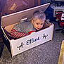 Elliot joined the competition — help win amazing prizes! toddler, child, toy_chest, carpet, indoor, smiling, playing, wooden_furniture, toy_trucks, gray_shirt, striped_pants, personalized, dinosaur_stickers, light, hair, face, candid, home, floor, cute