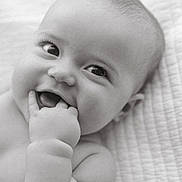 Collins joined the competition — help win amazing prizes! baby, infant, child, smiling, chewing, fingers, close_up, black_and_white, cute, happy, face, skin, lying_down, blanket, portrait, young, expression, innocence, soft, newborn