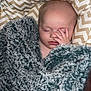 Wyatt joined the competition — help win amazing prizes! baby, sleeping, blanket, cozy, hand, face, pillow, zigzag_pattern, soft_texture, infant, rest, comfort, cute, child, indoors, peaceful, nap, warm, fuzzy, toddler