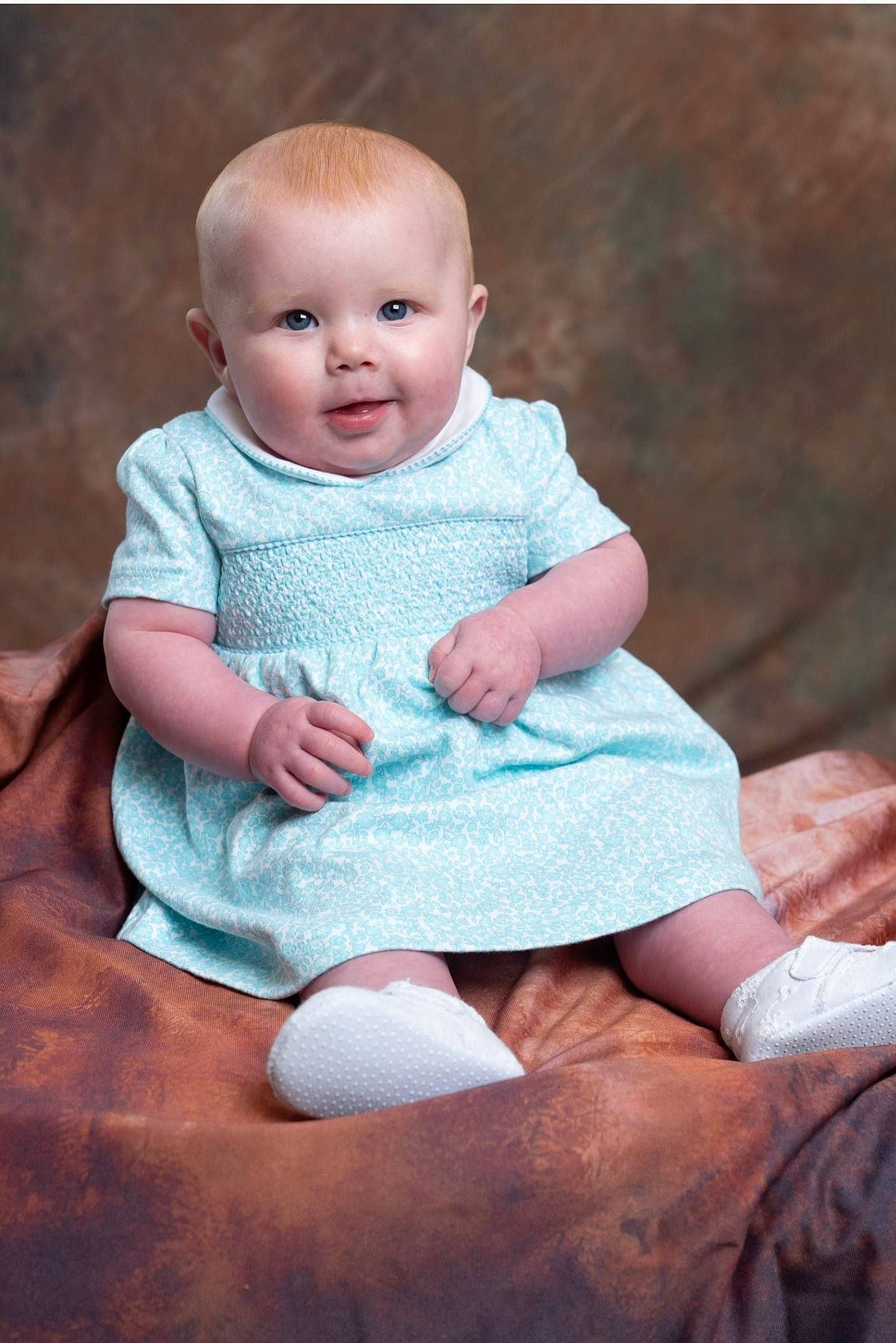 Lucie is registered to the contest to win money with this photo: baby, baby_toddler_clothing, cheek, child, comfort, finger, flash_photography, foot, grass, happy, human_leg, iris, pattern, person, pink, sitting, skin, sleeve, smile, sock