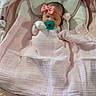 Blakeleigh is registered to the contest to win money with this photo: baby, newborn, pacifier, blanket, pink, headband, infant, sleeping, baby_rocker, soft_fabric, cute, resting, indoors, child, cozy, comfort, small, adorable, peaceful, wrapped
