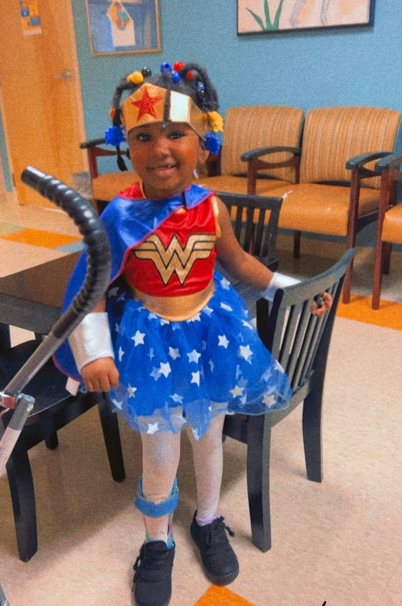 Ja'Kyra joined the competition — help win amazing prizes! chair, child, costume, electric_blue, event, fictional_character, fun, happy, headwear, human_leg, joy, person, picture_frame, room, smile, sock, toddler, uniform, vacation