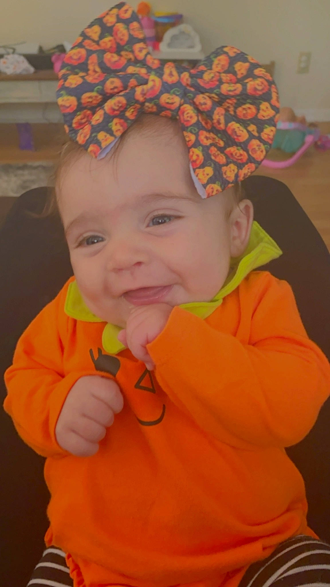 Poseymae joined the competition — help win amazing prizes! baby, baby_toddler_clothing, cheek, clothing, face, facial_expression, happy, head, human_body, lei, nose, orange, organ, outerwear, person, product, skin, sleeve, smile, standing