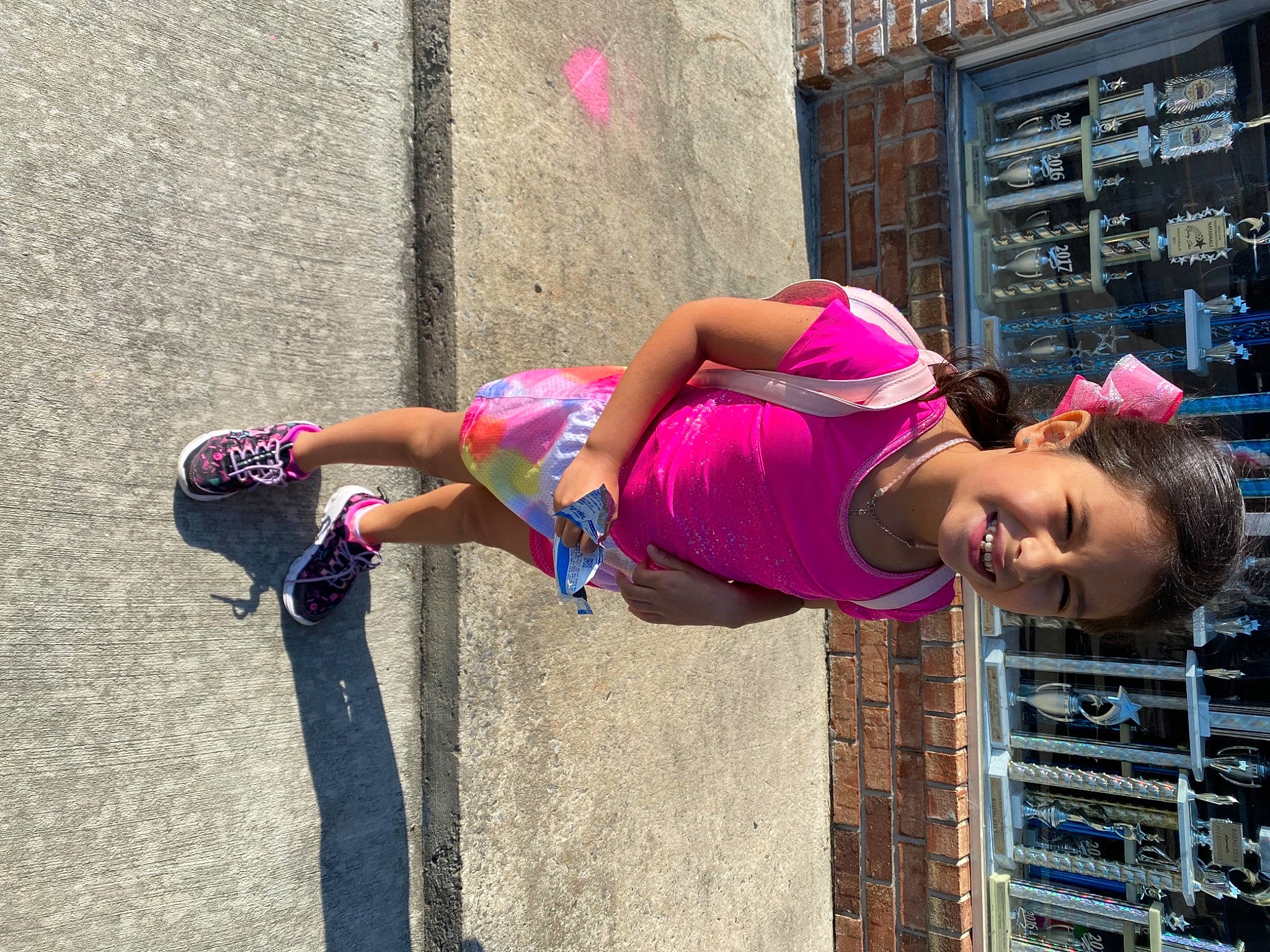 Dakota joined the competition — help win amazing prizes! building, electric_blue, footwear, fun, hat, human_leg, joy, leg, leisure, magenta, pedestrian, person, pink, recreation, shoe, shorts, street, street_fashion, t_shirt, thigh