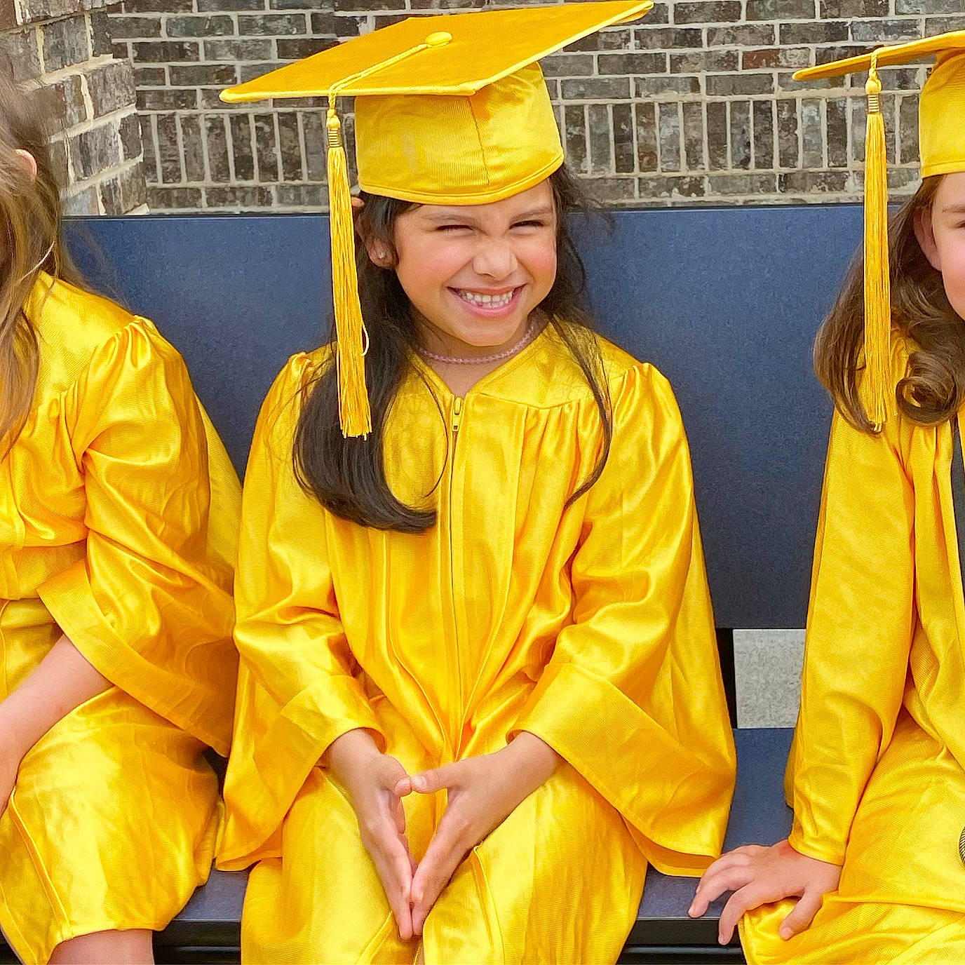 Dakota is registered to the contest to win money with this photo: academic_dress, academic_institution, event, facial_expression, fashion, fashion_design, fun, gesture, graduation, happy, headgear, headwear, joy, mortarboard, organ, person, phd, room, scholar, smile