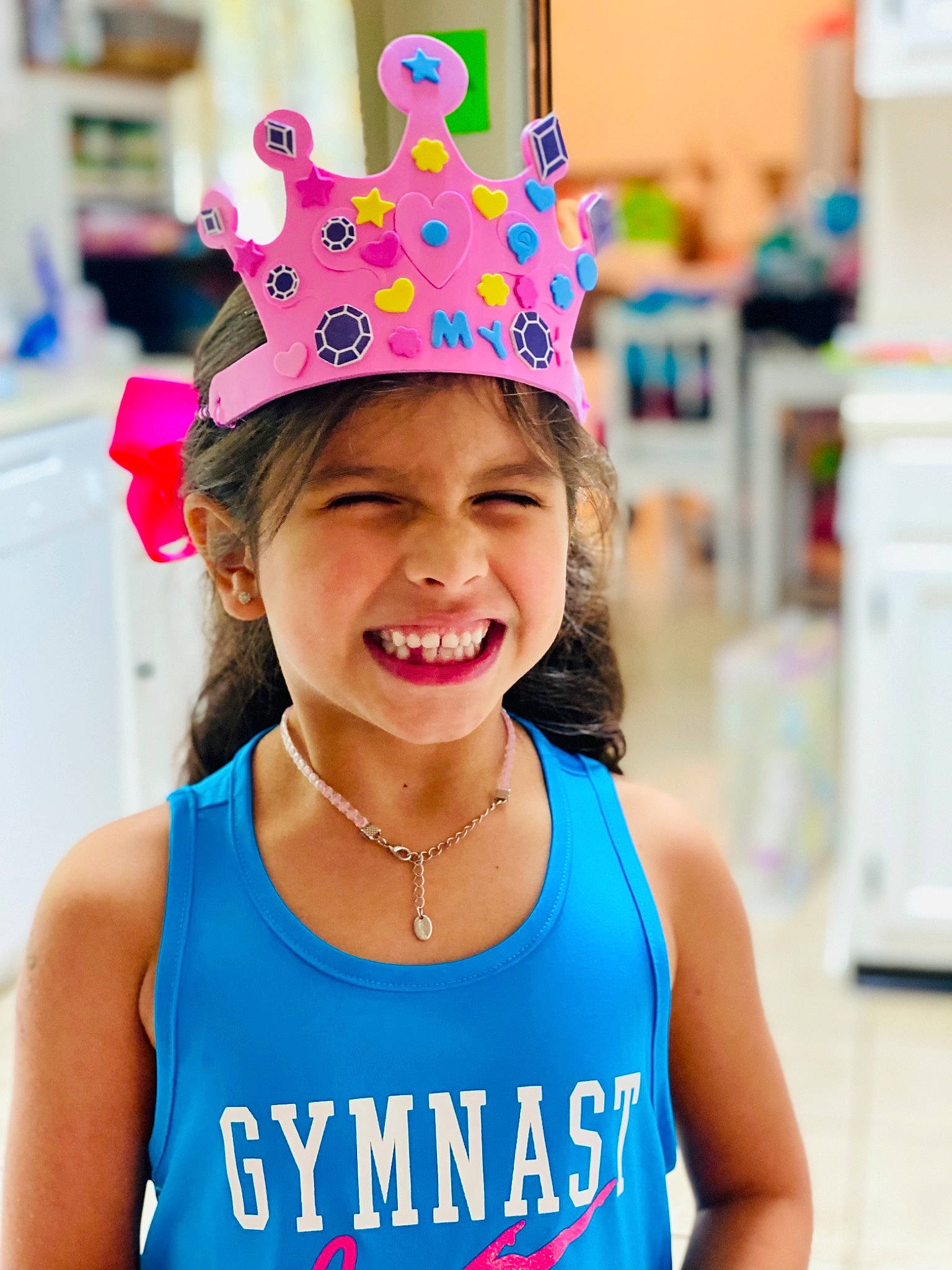 Dakota is registered to the contest to win money with this photo: active_tank, bicycle_helmet, blue, cap, costume_hat, facial_expression, fashion, fun, hairstyle, happy, headgear, headwear, helmet, joy, leisure, person, photograph, recreation, smile, sportswear