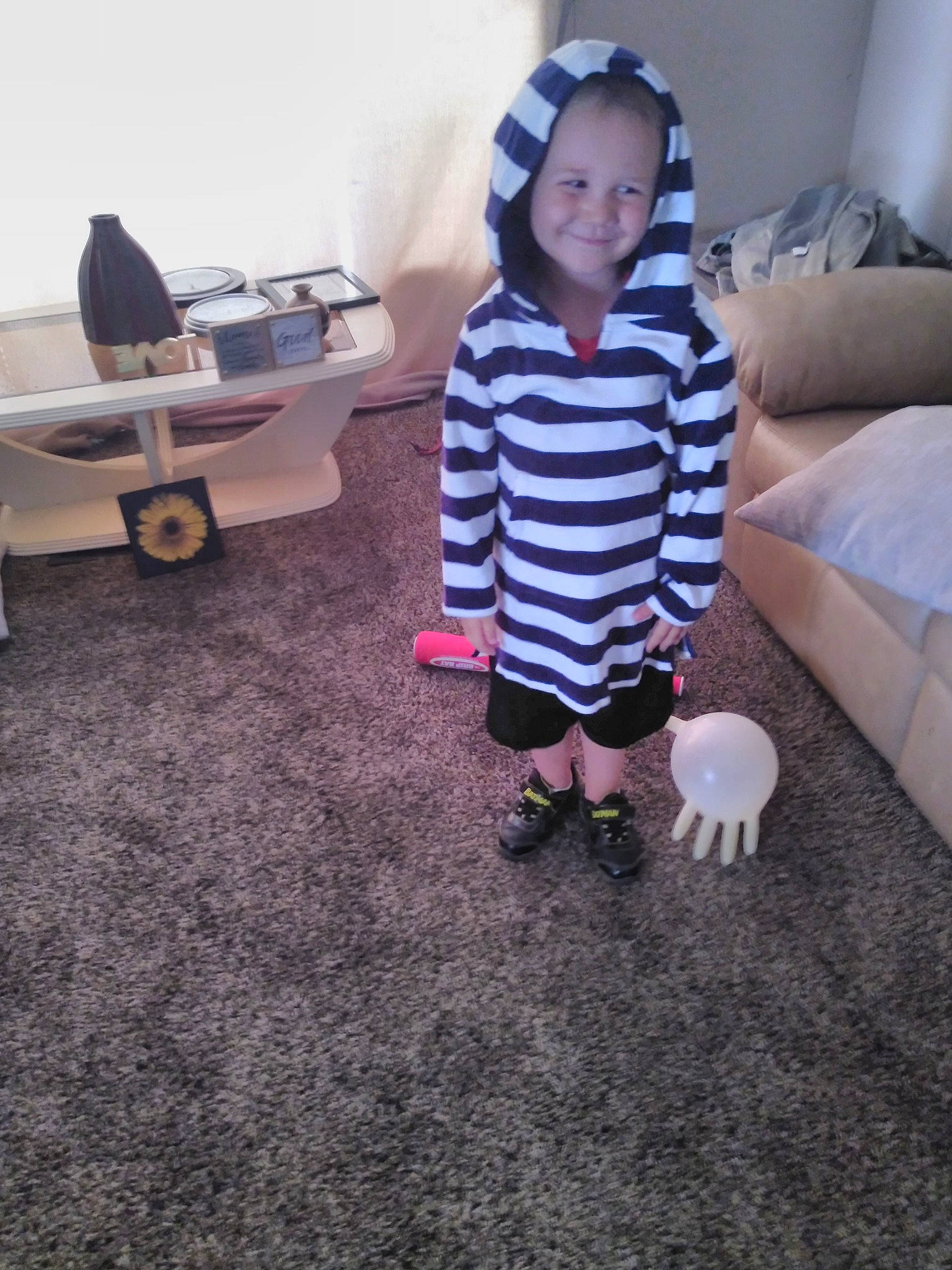 Alexander joined the competition — help win amazing prizes! ball, black, child, couch, floor, flooring, fun, happy, joy, leg, mammal, people, person, shorts, sleeve, smile, t_shirt, tire, toddler, vertebrate