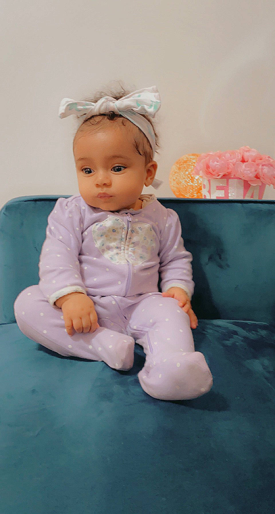 Isabella joined the competition — help win amazing prizes! arm, baby, baby_toddler_clothing, baby_toys, cheek, child, dress, fashion_accessory, finger, foot, happy, headband, headpiece, peach, person, pink, sitting, sleeve, toddler, toy