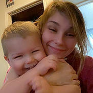 Thomas joined the competition — help win amazing prizes! affection, blond_hair, bonding, casual, child, closeup, cozy, face, family, happy, home, hug, indoor, love, people, portrait, smile, toddler, warmth, woman