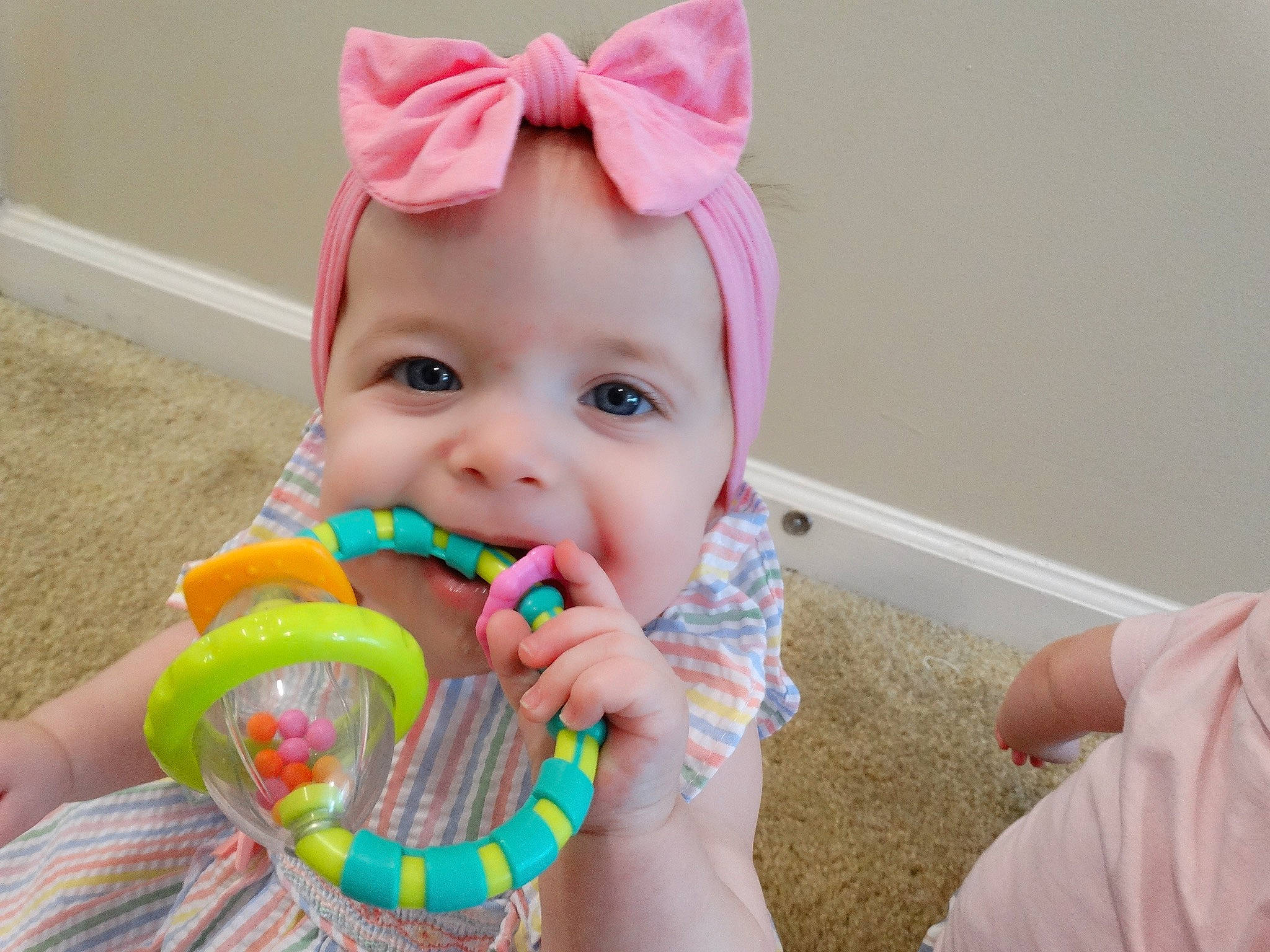 Sparkle is registered to the contest to win money with this photo: baby, baby_products, baby_toddler_clothing, child, dress, event, finger, food, fun, happy, hard_candy, headwear, holiday, musical_instrument, party, party_supply, person, pink, play, smile