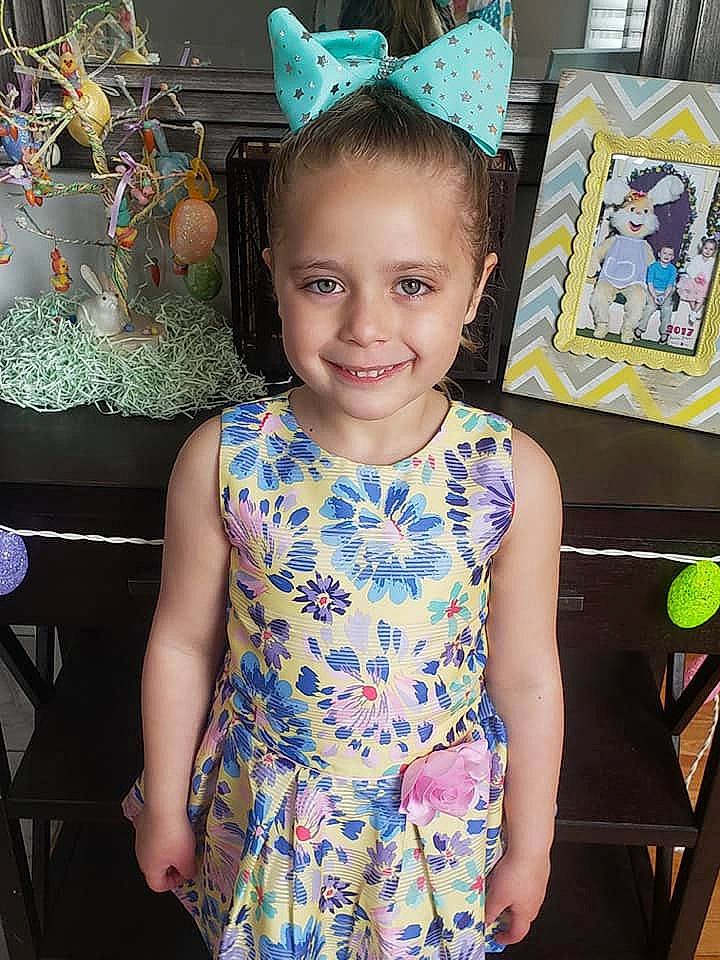 Hadley is registered to the contest to win money with this photo: child, ear, happy, head, iris, joy, neck, party, pattern, person, smile, t_shirt, toddler, vacation