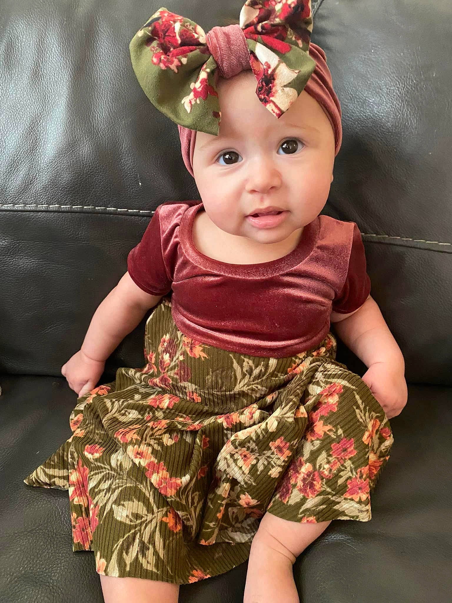 Gracelynn joined the competition — help win amazing prizes! baby_toddler_clothing, costume_hat, day_dress, dress, green, happy, head, headgear, headwear, human_body, lip, neck, one_piece_garment, pattern, person, pink, skin, sleeve, textile, thigh