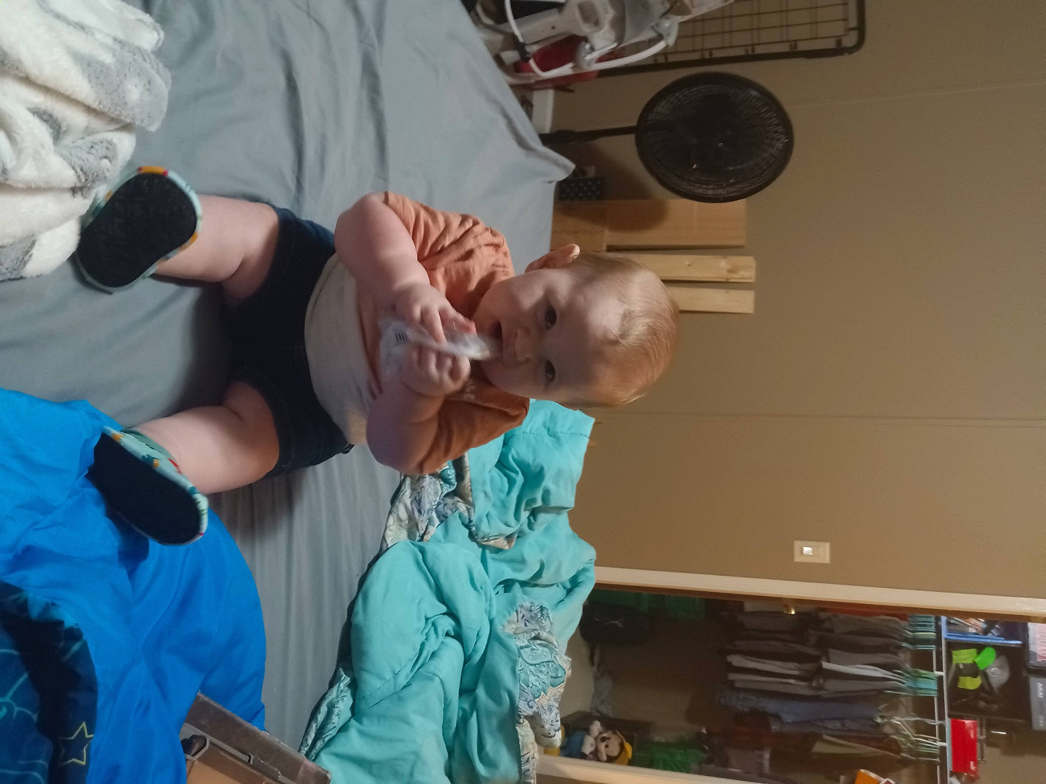 Chandler is registered to the contest to win money with this photo: baby, box, child, elbow, event, finger, fun, gesture, joint, mechanical_fan, person, room, service, shorts, t_shirt, thumb, toddler, water, wrist