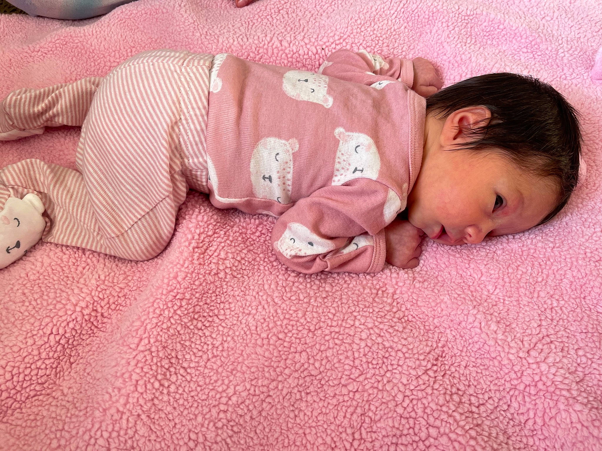 Amaya is registered to the contest to win money with this photo: arm, baby, baby_sleeping, baby_toddler_clothing, cheek, comfort, eye, face, finger, floor, flooring, human_body, linens, mouth, nose, person, pink, skin, sleeve, toddler