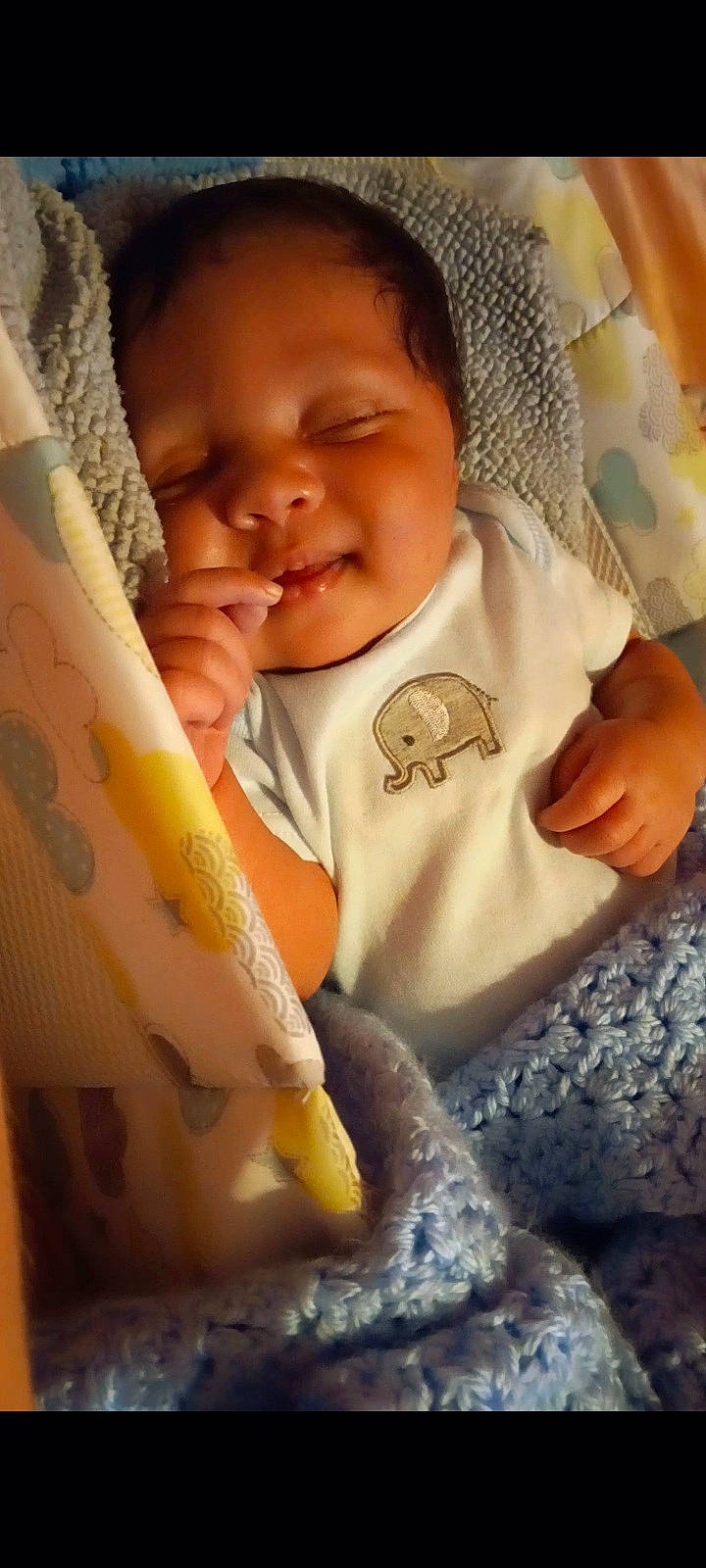 Kendrick joined the competition — help win amazing prizes! baby, baby_products, baby_safety, baby_sleeping, baby_toddler_clothing, cheek, child, comfort, finger, happy, linens, lip, nose, pattern, person, sitting, skin, sleeve, smile, textile