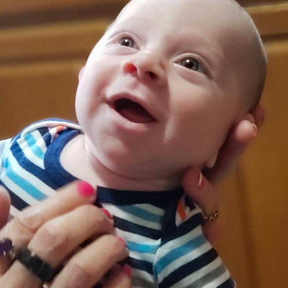 Elijah is registered to the contest to win money with this photo: baby, baby_making_funny_faces, cheek, child, chin, eye, face, facial_expression, finger, gesture, hand, happy, head, laugh, lip, mouth, nose, person, skin, smile