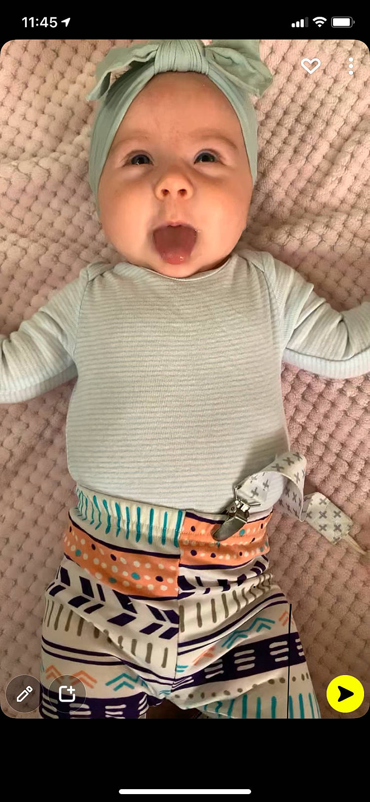 Octavia is registered to the contest to win money with this photo: baby, baby_products, baby_toddler_clothing, cheek, comfort, finger, happy, headwear, human_body, iris, neck, organ, pattern, person, skin, sleeve, smile, t_shirt, textile, toddler