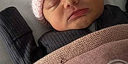 Hallie joined the competition — help win amazing prizes! newborn, baby, sleeping, blanket, pink, hat, knitted, cozy, infant, child, peaceful, wrapped, soft, portrait, cute, resting, indoors, closeup, face, toddler